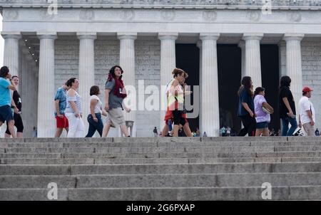 (210708) -- WASHINGTON, D.C., July 8, 2021 (Xinhua) -- People visit the Lincoln Memorial in Washington, DC, the United States, on July 7, 2021. The highly transmissible Delta variant has overtaken the Alpha variant to become the dominant variant in the United States, according to new estimates from the U.S. Centers for Disease Control and Prevention (CDC). Delta, which was first found in India and is now in over 100 countries, represented 51.7 percent of new infections in the United States over the two weeks ending on July 3, according to the CDC. (Xinhua/Liu Jie) Stock Photo