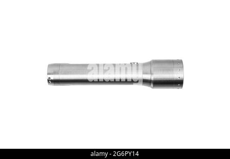 Modern silver metal LED flashlight. Pocket portable rechargeable lighting device. Isolate on a white background. Stock Photo