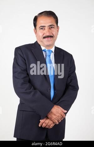 Mature senior company director CEO holding hand portrait Stock Photo