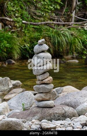 A stone tower by the river Stock Photo