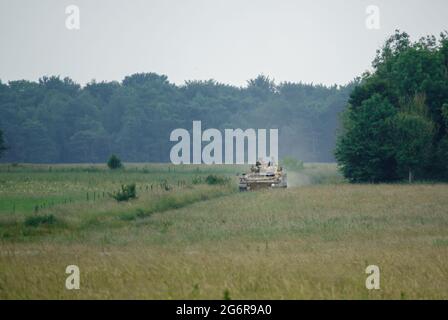 british army FV 510 Warrior light infantry fighting vehicle on maneuvers on Salisbury Plain, Wiltshire Stock Photo