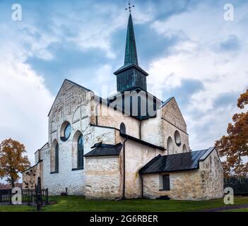 Medieval white washed church of Skallinge in Ostergotland, Sweden.