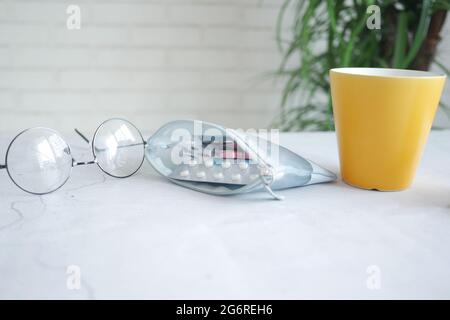 pills of blister pack in a small bag on table  Stock Photo