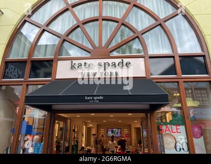 Roermond, Netherlands - July 1. 2021: View on store facade with logo lettering of kate spade fashion brand Stock Photo