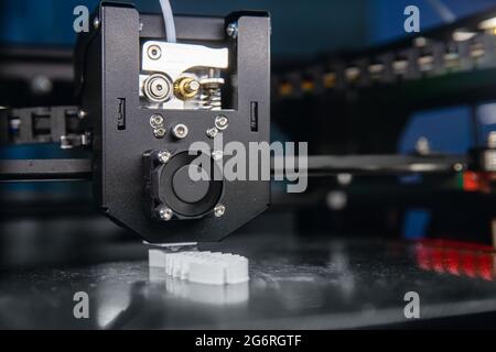 Closeup 3D Printer mechanism working element design of device during processes. Stock Photo