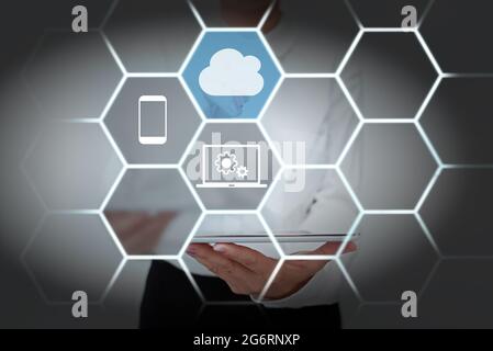 Lady In Uniform Standing Holding Tablet Presenting Late Tech Knowledge. Business Woman Carrying Pad Showing New Futuristic Technologies. Stock Photo