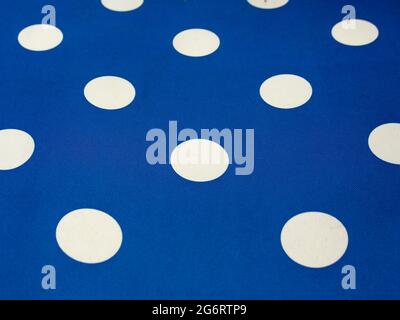 White dot pattern on the fabric of a lounge chair, captured at a garden near the colonial town of Villa de Leyva, in the central Andes of Colombia. Stock Photo