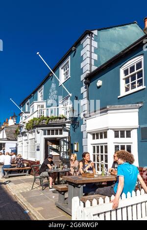 People sitting outside the Albion Inn in East Molesey, London, UK Stock Photo