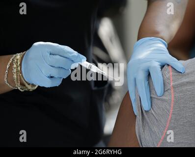 Brooklyn, United States. 08th July, 2021. Patients receive the Moderna Vaccine when Amazon Studios and health tech startup Carbon Health host a series of pop-up vaccination sites across New York City and Los Angeles to increase vaccine accessibility within the cities' underserved populations in New York City on Thursday, July 8, 2021. Photo by John Angelillo/UPI Credit: UPI/Alamy Live News Stock Photo