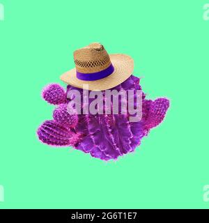 Creative composition, artwork. Round purple cactus wearing straw hat. Copyspace for advertisement Stock Photo