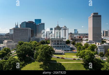 Aerial drone view of the Tennessee state capitol building in Nashville with the business district Stock Photo