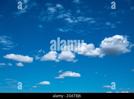 Cloudy landscape on a blue sky Stock Photo