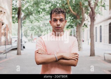 Portrait of latin guy, confident pose looking at the camera Stock Photo