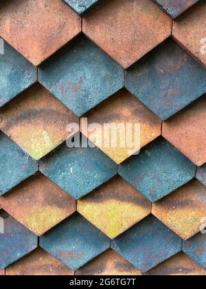 Pattern of vertical hanging clay tiles on a old hay loft in Somerset,England Stock Photo