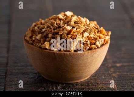 Dehydrated Lemon Peel on a Rustic Wooden Table Stock Photo