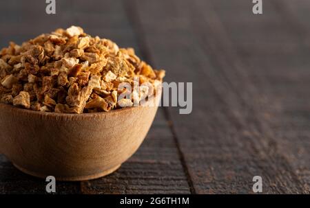 Dehydrated Lemon Peel on a Rustic Wooden Table Stock Photo