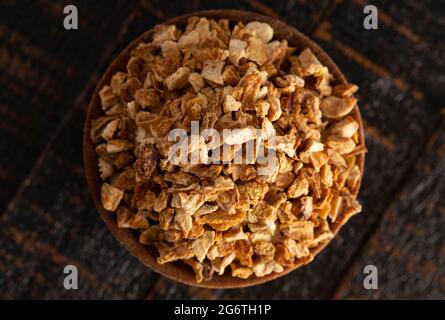 Dehydrated Lemon Peel on a Rustic Wooden Table Stock Photo