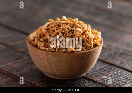 Dehydrated Lemon Peel on a Rustic Wooden Table Stock Photo