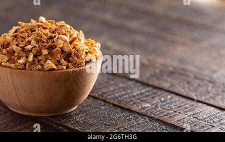Dehydrated Lemon Peel on a Rustic Wooden Table Stock Photo