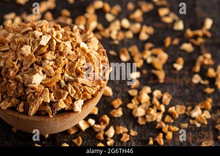 Dehydrated Lemon Peel on a Rustic Wooden Table Stock Photo