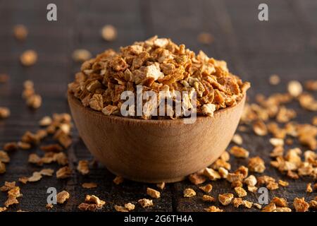 Dehydrated Lemon Peel on a Rustic Wooden Table Stock Photo
