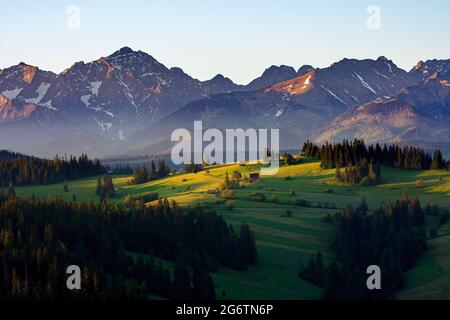 View of the High Tatras from Gliczarow Gorny in summer. Stock Photo