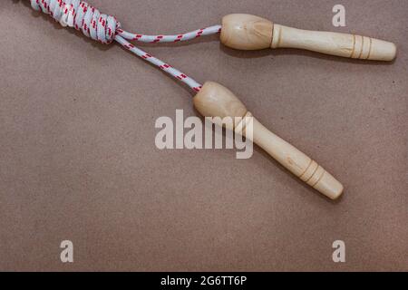 skipping rope on a neutral background with ample copy space Stock Photo