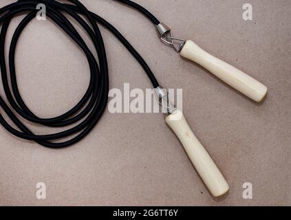 skipping rope on a neutral background with ample copy space Stock Photo