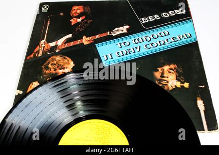 Disco and soul artists, the Bee Gees music album on vinyl record LP disc. Titled: To Whom It May Concern album cover Stock Photo