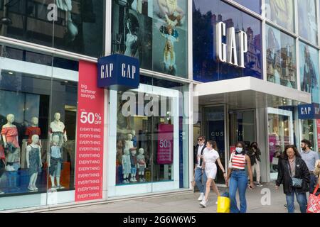 London, UK, 8 July 2021: Clothes are being sold at heavy discounts at this branch of Gap on London's Oxford Street. All 81 UK and Irish branches of the San Francisco based fashion chain will be closed in Late August or September but an online presence will be maintained. It is estimated that over 1000 jobs will be lost. Anna Watson/Alamy Live News