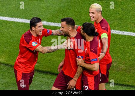 Baku, Azerbaijan - June 20: Haris Seferovic of Switzerland (C) celebrating his goal with his teammates during the UEFA Euro 2020 Championship Group A Stock Photo