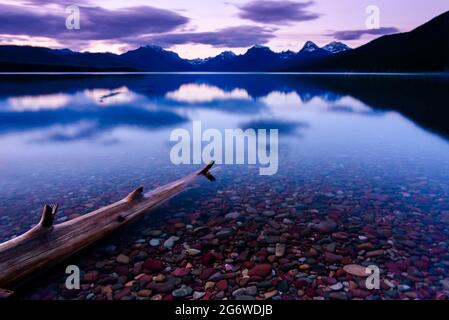 Sunset over lake McDonald Stock Photo