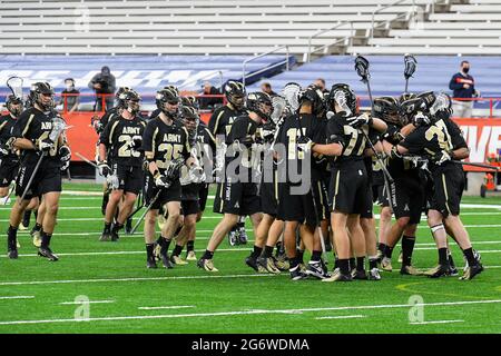 February 21, 2021: Army Black Knights players celebrate following an NCAA mens lacrosse game against the Syracuse Orange on Sunday, Feb., 21, 2021 at the Carrier Dome in Syracuse, New York. Army won 18-11. Rich Barnes/CSM Stock Photo