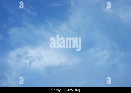 Wispy clouds in the sky Stock Photo