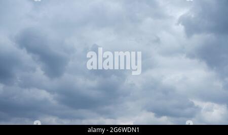 Fluffy Clouds drifting Stock Photo