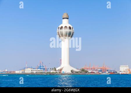 Lighthouse and traffic control tower as a symbol of the port of Jeddah ...