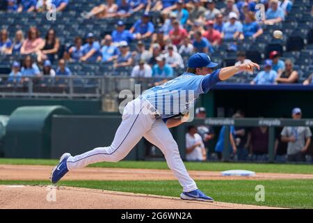 Kansas City MO, USA. 7th July, 2021. Kansas City pitcher Brady Singer (51) pitches during the game between the game with the Cinncinati Reds and the Kansas City Royals held at Kauffman Stadium in Kansas City Mo. David Seelig/Cal Sport Medi. Credit: csm/Alamy Live News Stock Photo