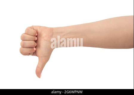 Woman hand thumb down sign isolated on white background. caucasian female hand with thumbs up gesture. Close-up female hand gesture dislike, bad, disa Stock Photo