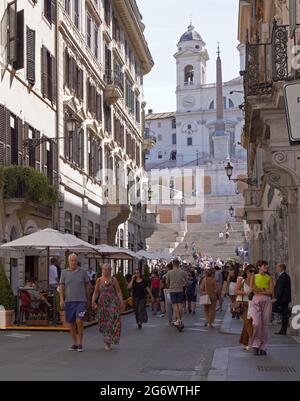 Rome, Italy. 3rd July, 2021. People walk on Via dei Condotti in Rome, Italy, on July 3, 2021. The economic growth in the European Union (EU) and in the eurozone would expand by 4.8 percent this year, and by 4.5 percent in 2022, according to the Summer 2021 Economic Forecast issued by the European Commission on July 7. Credit: Jin Mamengni/Xinhua/Alamy Live News Stock Photo