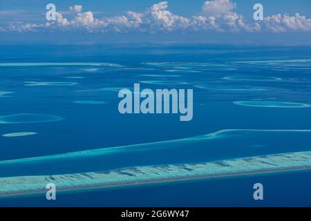 Maldives Beach Reef Sand. taken from different beaches of islands located in Maldives. Aerial view of coral sand cay on Great Barrier Reef, Queensland Stock Photo