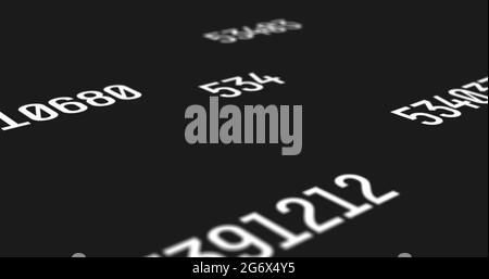 Sets of random numbers with a white font color projected on a black screen background Stock Photo