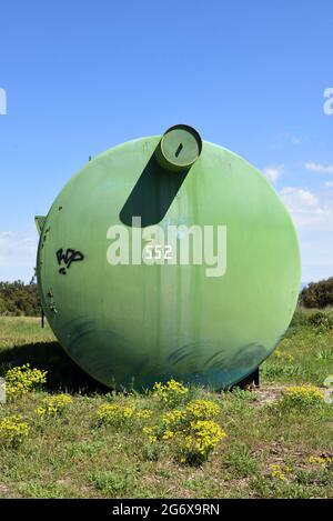 End View of Circular Water Tank, Water  Reserve Tank or Water Reservoir Containing Water or Retardant to Fight Forest Fires in southern France Stock Photo