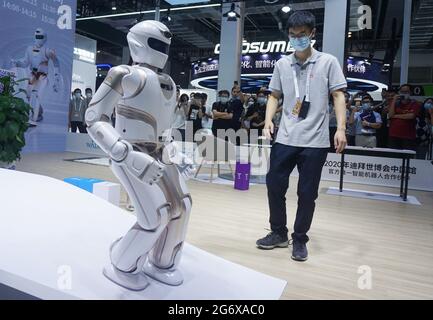 Shanghai, Shanghai, China. 9th July, 2021. On July 7, 2021, a new generation of large-scale humanoid service robot Walker X will play a Chinese chess match with the host at the 2021 World Artificial Intelligence Conference.On the same day, a new generation of large-scale humanoid service robot Walker X made its world premiere at the 2021 World Artificial Intelligence Conference (WAIC2021) in Shanghai, attracting a large number of audiences to watch.The large-scale humanoid service robot Walker X demonstrated on-site functions such as going up stairs, going down slopes, playing chess, complia Stock Photo