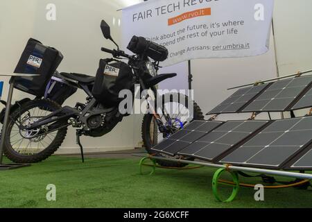 Rome, Italy - Dec 4 2019: a Sur Ron enduro electric motorbike with about 50 miles (80 km) of range. On this model to improve autonomy the bike has a p Stock Photo