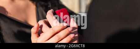 partial view of man making proposal to girlfriend outdoors, banner Stock Photo