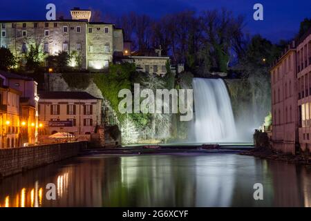 Isola del Liri, Italy - 10 February 2020: Long exposure and night view of Isola del Liri medieval city famous for waterfalls in the historical center Stock Photo