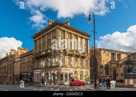 Located at 40-44 Mosley Street in Newcstle upon Tyne, just adjacent to St Nicholas' Cathedral, part of which can be seen right of shot, is the former Stock Photo