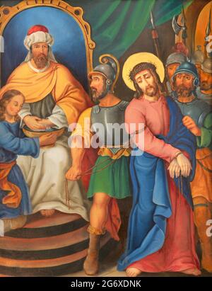 VIENNA, AUSTIRA - JUNI 17, 2021: The painting Jesus before Pilate as part of Cross way stations in church Rochuskirche unknownr artist. Stock Photo