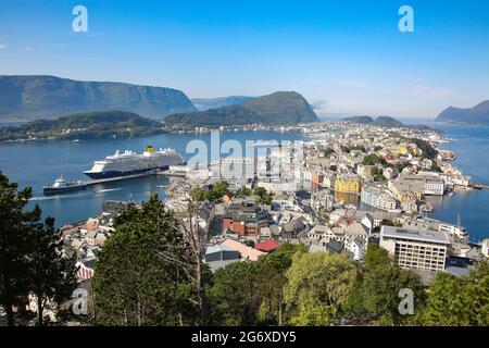 View of Alesund; Panoramic view of the archipelago, the beautiful town centre, art nouveau architecture and fjords from Aksla, Alesund, Norway. Stock Photo