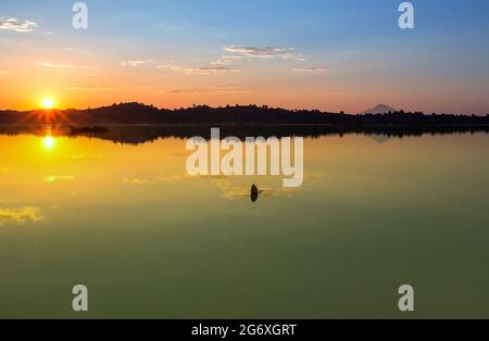 Sunrise at the sea. Halkidiki, Sithonia. View of Mount Athos. Stock Photo